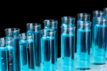 Test-tubes on blue background