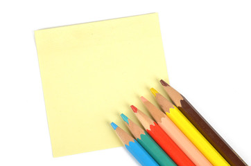 Post-it note and pencils