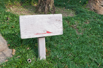 wooden sign with arrow