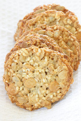 Whole grain biscuits on white background