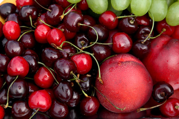 Background of cherry, black cherry, nectarines, grapes