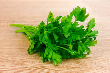 fresh parsley on wooden background