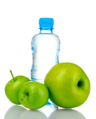 ripe green apples plastic bottle isolated on white