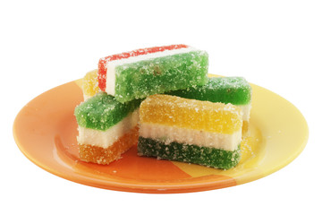 Colored fruit jelly on the plate