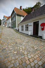 Wooden houses in Bergen on cobbled street