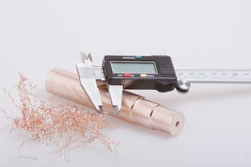 Digital calipers & bronze spigot.