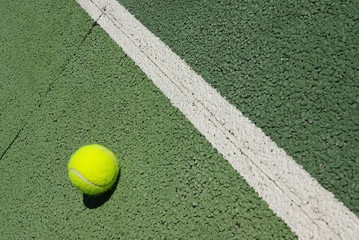 Tennis ball on court