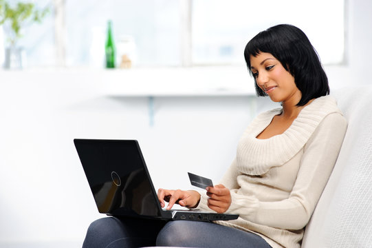 Woman making online reservations
