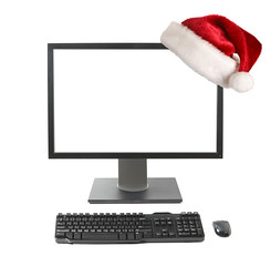 Cristmas online shopping concept - Computer with Santa hat