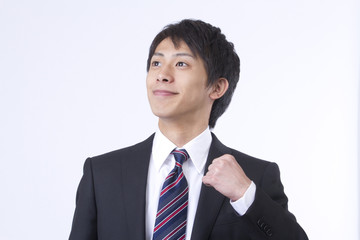 ガッツポーズの新人ビジネスマン