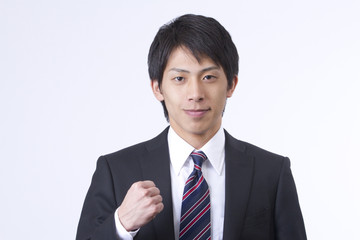 ガッツポーズの新人ビジネスマン