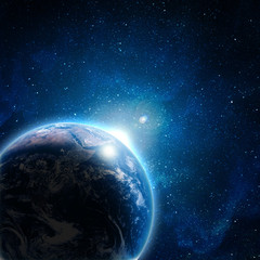 Obraz na płótnie Canvas Blue Earth w przestrzeni z wschodzącego słońca