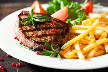 Grilled rustic steak with french fries