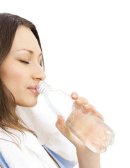 Woman in fitness wear with water, isolated