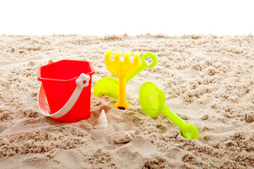 Plastic play toy on sand