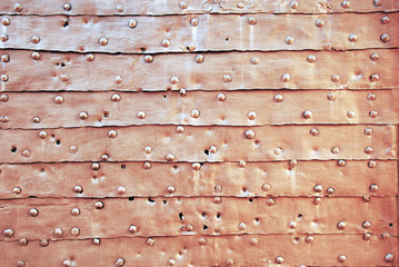 Rusty ancient metallic gate surface