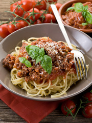 spaghetti bolognese with ragout sauce and parmesan cheese