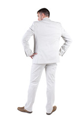 Fototapeta premium Businessman looks ahead. rear view.