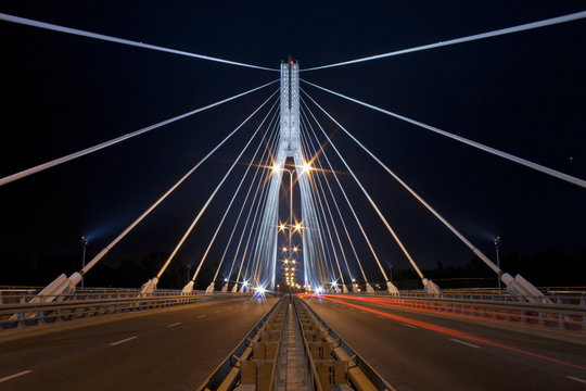 Fototapeta Night view of the new Swietokrzyski Bridge in Warsaw.