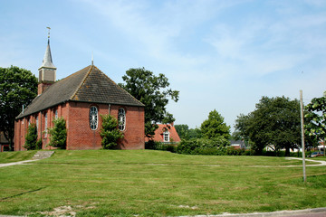 Fototapeta na wymiar Dutch Reformed Church of the Dutch village of Zoutkamp