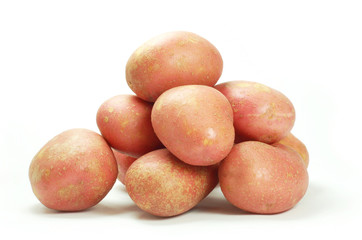 Rooster potatoes on white background © Joanna Parkinson
