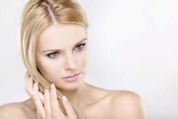 Fototapeta premium Young pretty woman with beautiful blond hairs