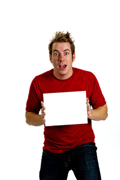 Excited Young Man holding a blank white sign