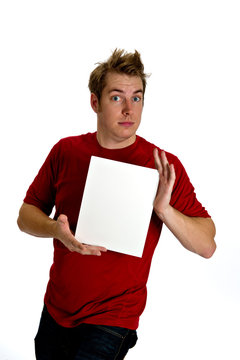 Engaging Young Man holding a blank white sign