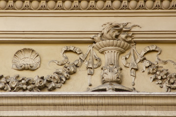 Torch sculpture on a wall