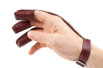 Archery shooting glove on hand, isolated on white