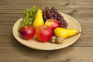 fruits on wooden dish