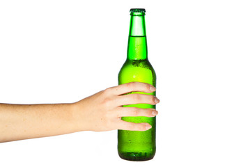 Woman hand holding bottle of beer