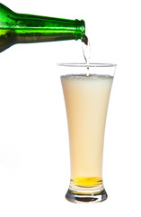 Pouring beer isolated on white