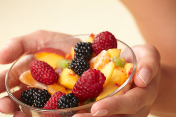fruit salad in the hands