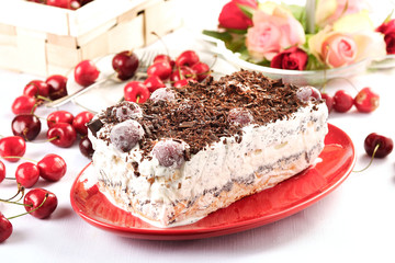 white cake with cherry