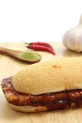 Hamburher on wood background