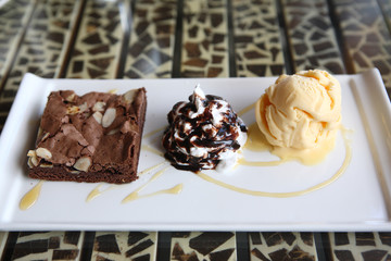 Cake with ice cream and cream