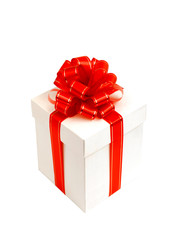 White gift box with red bow isolated on white
