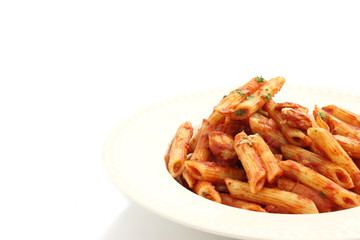 Pasta macaroni with tomato sauce isolated in white background