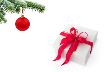 Fototapeta na wymiar Christmas tree over gift with red ribbon