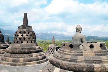 Stone Buddha and Borobudur Temple