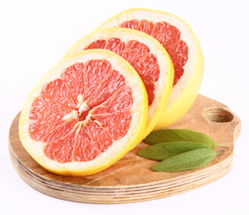 Grapefruit, a sliced half on white background