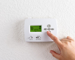 digital thermostat with finger