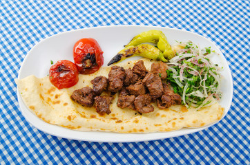 Kebab served in the plate