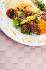 Meat cuisine - kebab served in plate