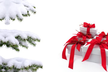 Christmas tree over  gift with red ribbon