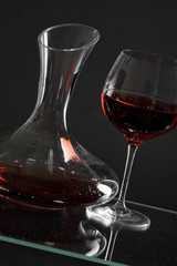wine glass and carafe with red wine
