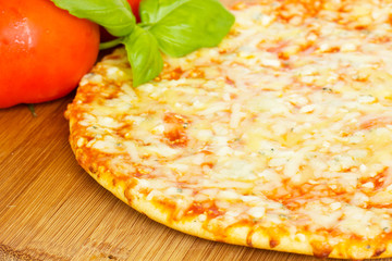 pizza quatrro fromaggi (four cheese) with fresh tomatoes