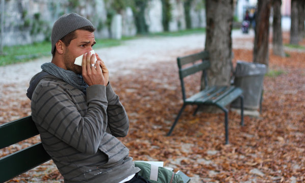 Man Blowing Nose