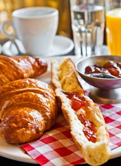 fresh croissant on table